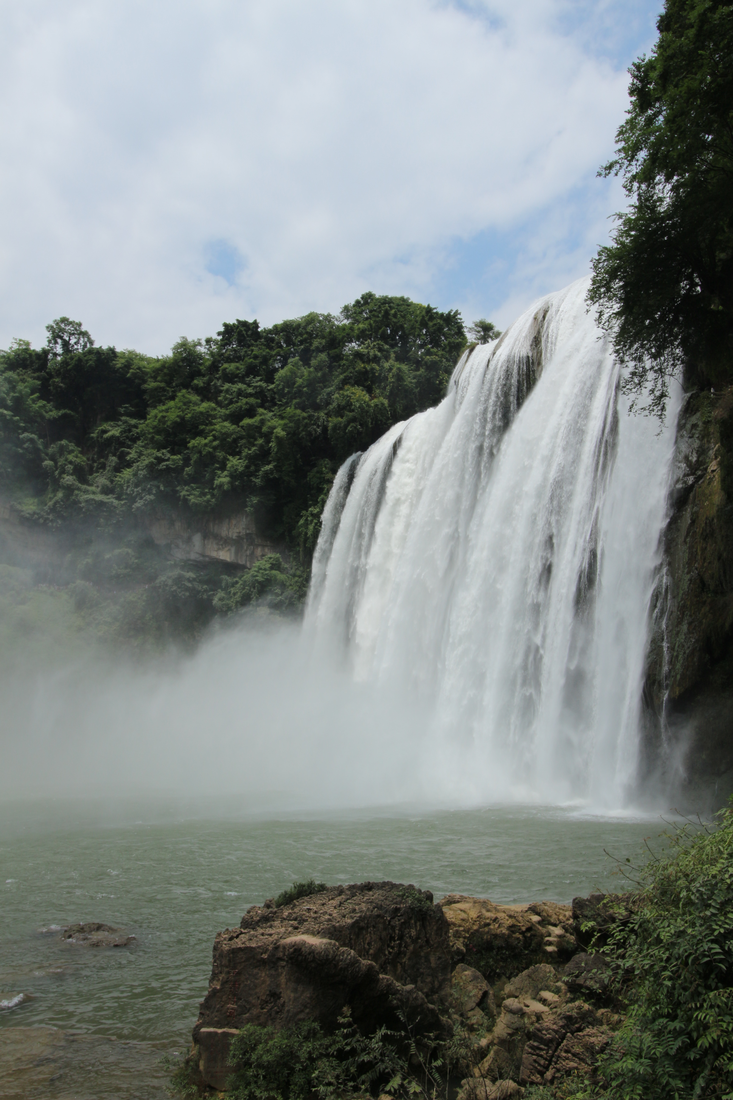 Huangguoshu Waterfall from the riverside · Anshun