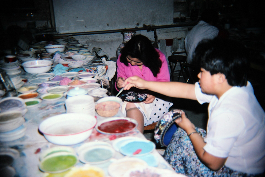 Applying enamel in Beijing · archival photograph, 1991