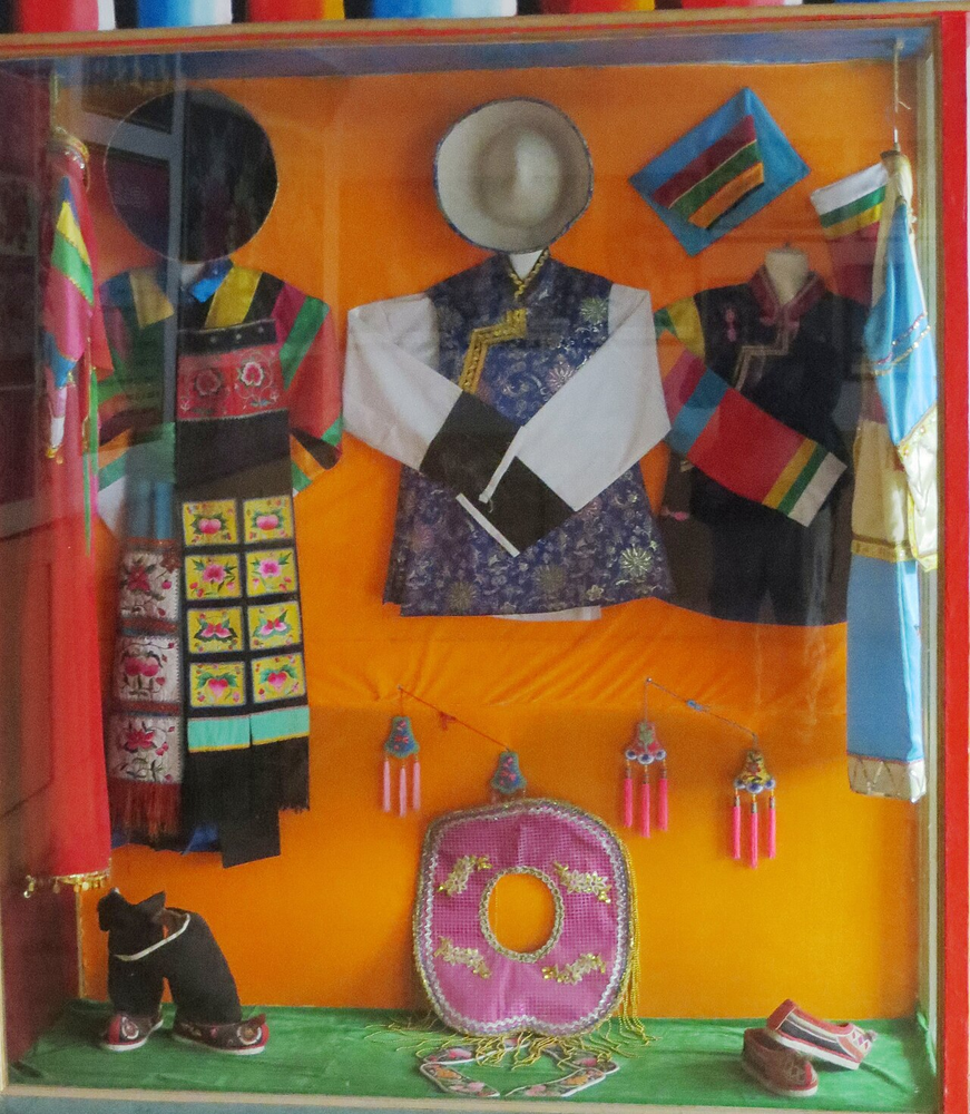Tu clothing displayed at Ma Bufang Mansion · Xining